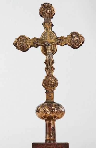 null Processional cross with a wooden core covered with repoussé copper, engraved...