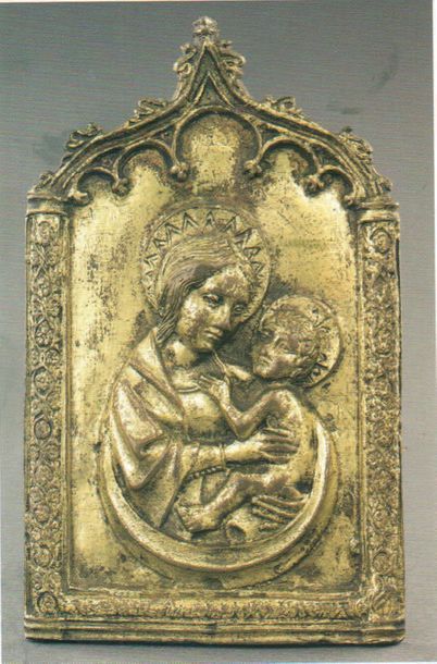 null Baiser de Paix en bronze en partie doré présentant la Vierge à l'Enfant en buste.
Dans...
