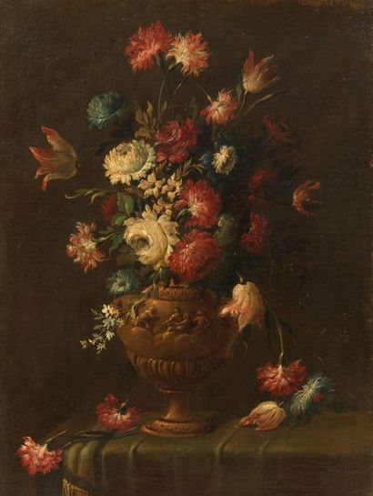 ÉCOLE LOMBARDE DU DEBUT DU XVIIIE SIECLE Pair of still-life flowers in carved vases
Oil...
