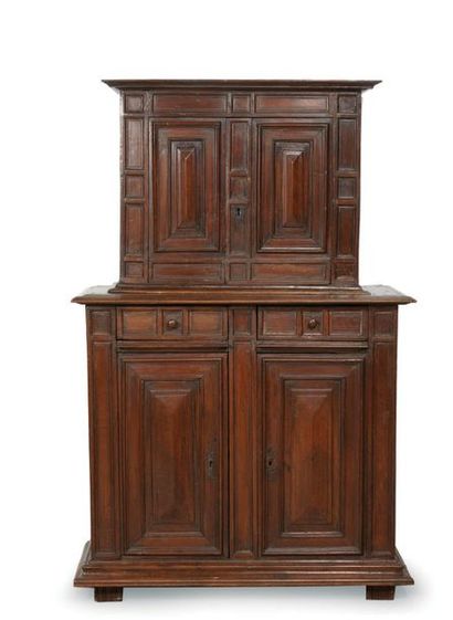 null TWO BODY WARDROBE in walnut with recessed upper body opening to four leaves...