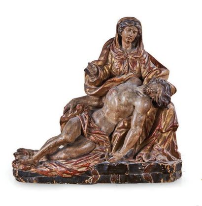 null PITIATE VIRGIN in carved, gilded and polychrome wood, back sketched. Sitting...