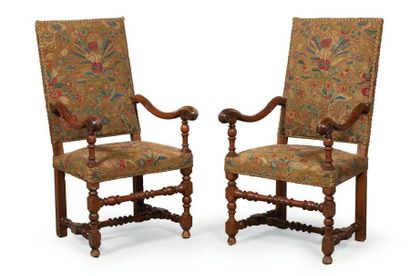  PAIR OF FAUTEUILS in walnut with high backrest, legs and supports of armrests turned...