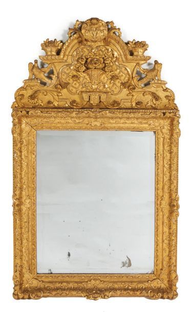 IMPORTANT MIRROR with gilded carved wooden...