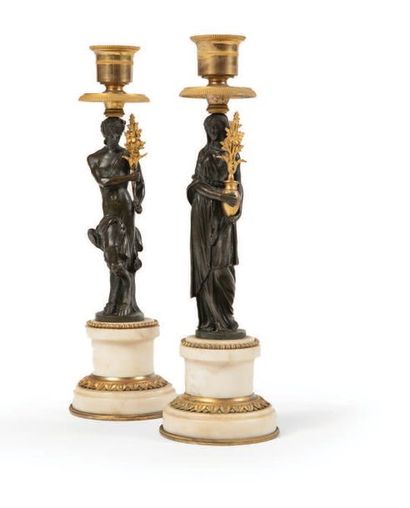  PAIR OF Candle holders in white marble, patinated bronze and gilded bronze. Circular...