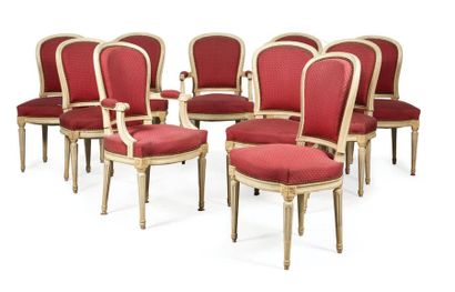 null CONTINUED BY EIGHT CHAIRS AND TWO FAUTEUILS in moulded and carved, cream lacquered...