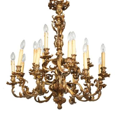  IMPORTANT gilded bronze chandelier with eighteen light arms arranged on two rows....