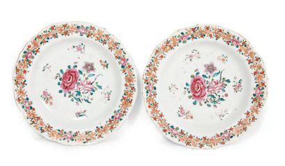 null TWO polyloped porcelain plates of the Pink Family, decorated with flowery branches.
China,...