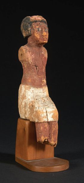 null ? PERSONNAGE DE MODÈLE.
Égypte, Moyen Empire.
Statuette représentant un homme...