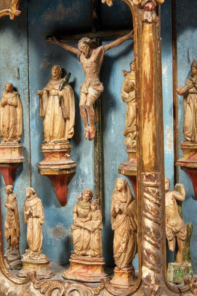 null ORATORY in carved, gilded and polychrome wood in the Baroque style with a Crucifixion...