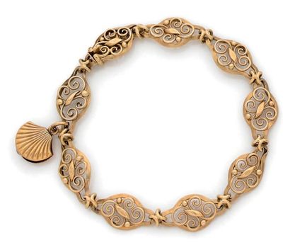 null BRACELET in 18k (750) yellow gold articulated with openwork filigree links and...