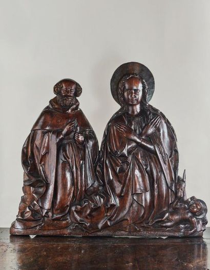 null NATIVITÉ en tilleul sculpté en bas-relief. Joseph et Marie sont agenouillés,...