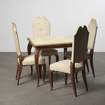 Jean-Charles MOREUX (1889-1956) 
Table à jeu en chêne ciré se composant: une table...
