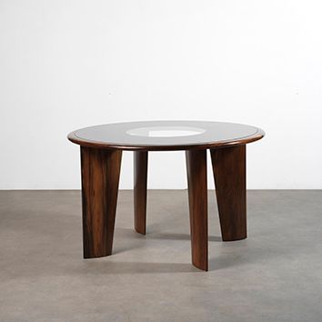 JOAQUIM TENREIRO (1906-1992) 
Table ronde
Palissandre* et verre
Circa 1960
H_76,5...