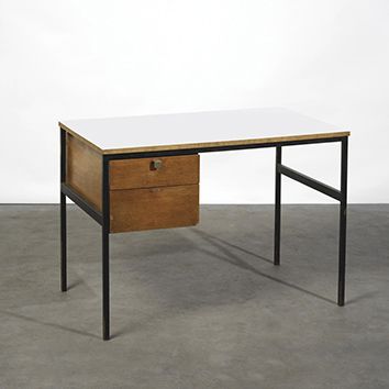 Pierre PAULIN (attribué à) 
Bureau à deux tiroirs
Chêne, formica blanc, métal laqué...