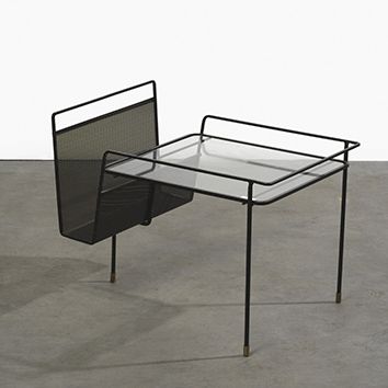 Mathieu MATÉGOT (1910-2001) 

A tripod coffee table / magazine
rack Perforated lacquered...