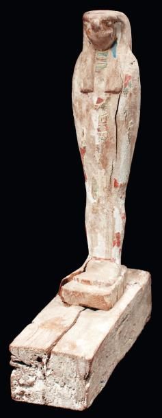 Égypte Statuette représentant le dieu Sokar. Il est momiforme, posé sur une base...