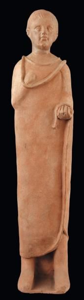 Néolithique & Antiquité classique Grande statue votive. Elle représente un jeune...