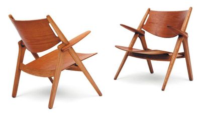 HANS J. WEGNER (1914-2007) Paire de fauteuils modèle « CH28 » Chêne et Teck. Edition...