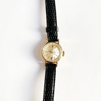 null OMEGA around 1950.

Ladies' watch in 18K (750) yellow gold with black leather...