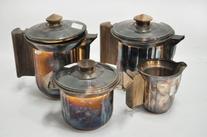 null Coffee set In silvery metal and wood, including a teapot, a coffee pot, a milk...