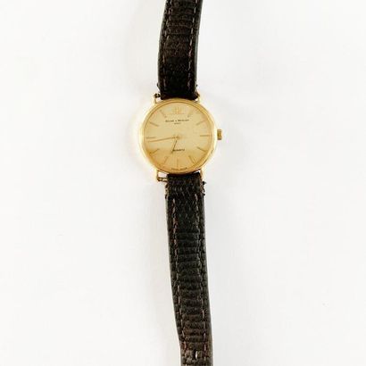 null Baume & Mercier, ladies' watch in 18K (750) yellow gold, round dial and leather...