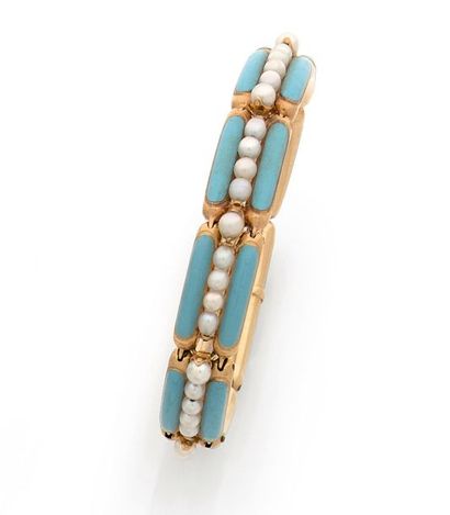null BRACELET in 18K (750) hollow yellow gold articulated with blue enamelled rectangular...