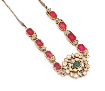 null NECKLACE in 18K (750) yellow gold and silk ribbon, the décolleté adorned with...