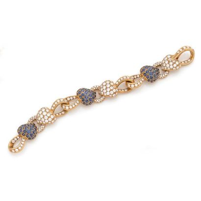 BOUCHERON. 
Articulated braCELET in 18K (750) yellow gold decorated with diamond...