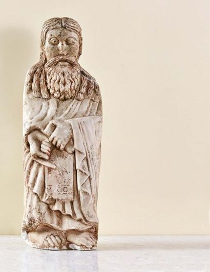 Carved marble prophet. Standing with his...