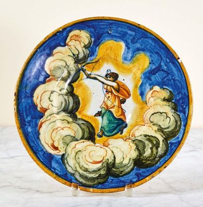 null Polychrome earthenware plate decorated with the goddess Diana arming her bow...