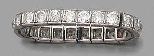 null ARTICULATED ALLIANCE in platinum entirely set with old cut diamonds.
Hallmark...