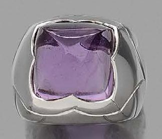 BVLGARI. 
18K (750) white gold domed ring with sugar loaf amethyst.
Signed.
TDD:...