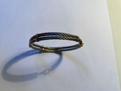 null Bracelet cable en or jaune 18K (750) et acier.

D_6 cm environ

Poids brut:...