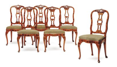 null Suite de six chaises en noyer teinté et ivoire à décor incrusté de fleurs et...