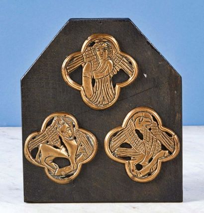 null THREE ELEMENTS OF A TETRAMORPHY in engraved and openwork bronze representing...
