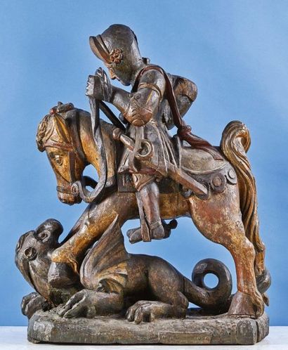 null Saint Georges terrassant le dragon en chêne sculpté en ronde-bosse et polychromé....