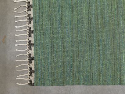RAKEL CALENDER (XXE SIÈCLE) Tapis
Laine verte
Green wool
Vers 1960
L_300 cm L_200...