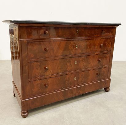 null Mahogany and flamed mahogany veneer chest of drawers, black marble top, the...