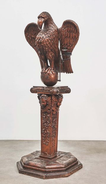  Beautiful carved oak lectern. Sheathed foot decorated with cherubs' heads and flowering...