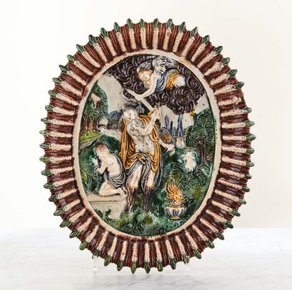 null Oval bowl on pedestal in polychrome glazed terracotta representing the Sacrifice...