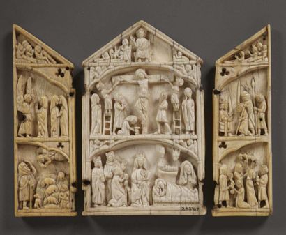 null Deeply carved ivory plaque representing scenes from the New Testament. The six...