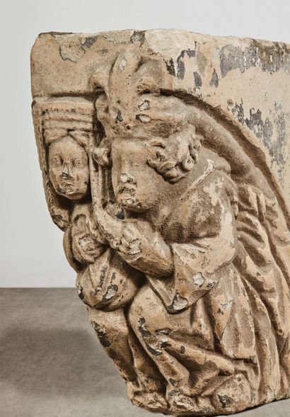 null Pair of carved limestone mantelpiece corbels representing two couples. On each...