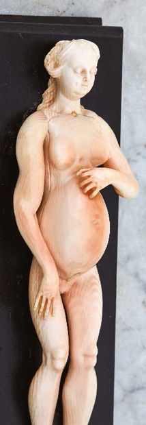 null Anatomical mannequin of a pregnant woman in carved ivory with red highlights....