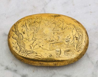 null Oval engraved brass box representing, on the face, the Crucifixion and the Entombment...