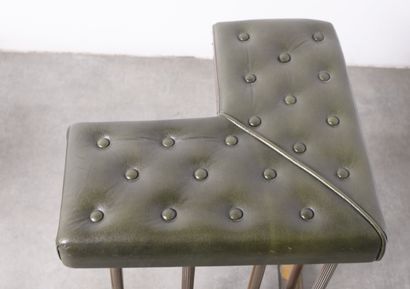 null Green leather upholstered and gilded brass mantelpiece bench with double seat....