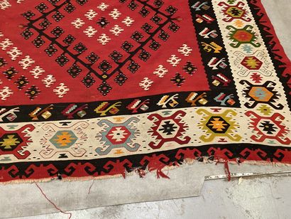 null Set of three kilim carpets. Carpet with red background, blue border (several...