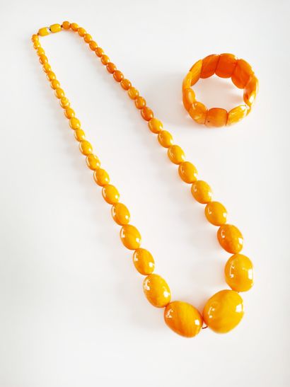 null Half set including a necklace of amber balls in fall and a matching bracele...