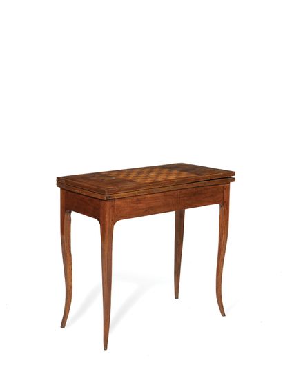 null GAME TABLE with swivel top in veneer and marquetry of various wood species....