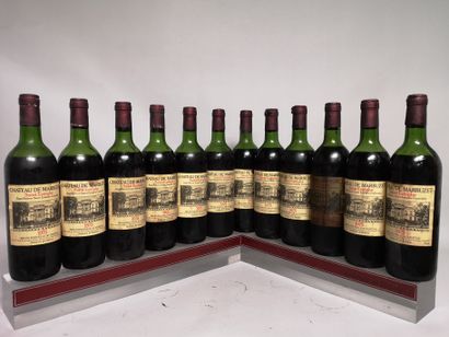 null 12 bouteilles Château de MARBUZET - Saint Estèphe 1975
Etiquettes tachées. 1...