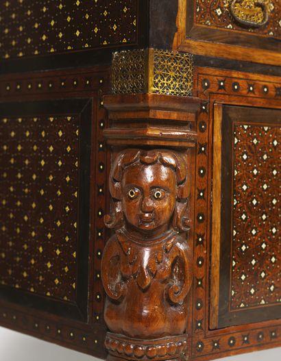null INDO-PORTUGUESE CABINET. Ebony, rosewood, bone and gilt brass mounts.
This cabinet...
